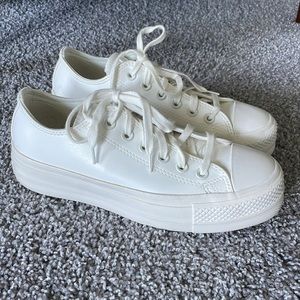 All white platform low top converse